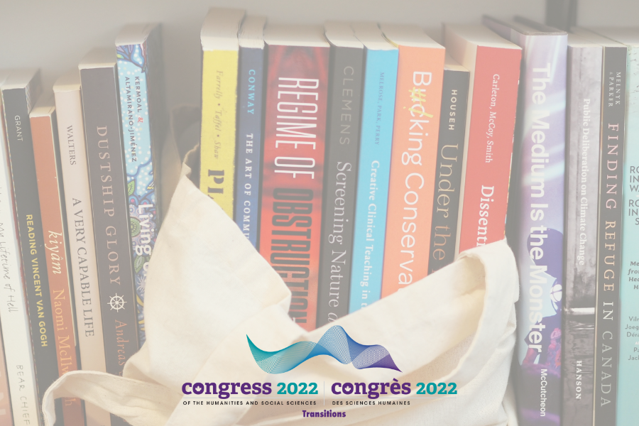 A tote bag filled with books sits on a bookshelf amidst many other books.